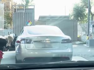 Supporting image for story: Driver is fuelled into thinking all-electric Tesla needs refilling at petrol station