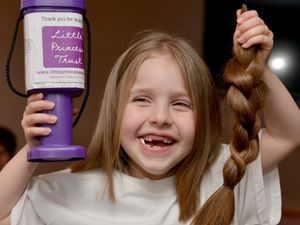 Supporting image for story: Mid Wales girl cuts off 15 inches of hair for children suffering with cancer