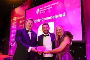 Wolves Foundation Head of Business Development Kieron Ansell picks up the Business in Community Award.