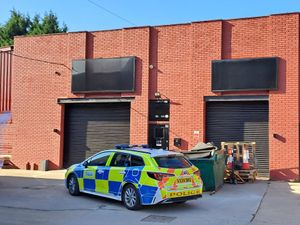 Police behind one of the shops