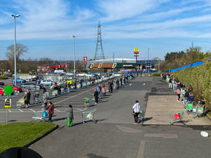 Asda spaced trolleys two metres apart in Great Bridge to enforce social distancing. Photo: John Kennett