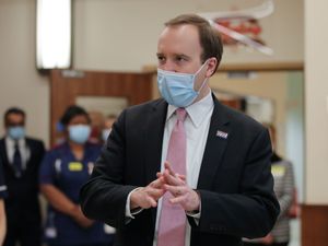 Supporting image for story: Hancock: Hugging could return in mid-May once vulnerable have received two doses