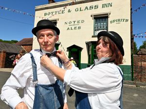 Supporting image for story: We took a nostalgic trip back to the 1940s with the Black Country Museum - including vintage cars, Laurel and Hardy impersonators and a classic 'press man'