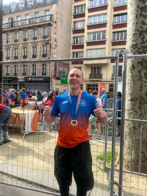 Mark in his commemorative Paris half marathon T-shirt