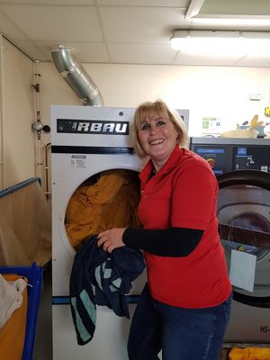 Sonia Clayton makes sure all the dogs have clean blankets and beds