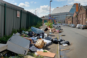 Household waste and furniture are part of the mounds of rubbish
