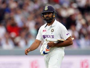 Rohit Sharma walks off after being given out