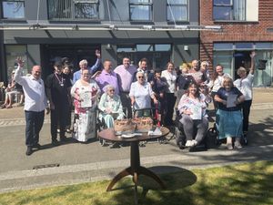 Rose Manor residents and the local community celebrating the service's 10-year anniversary