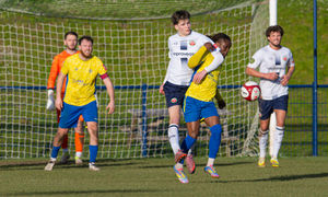 Shifnal's Alamu Abdulrasaq is restrained. Picture: Jim Wall