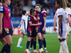 Barcelona’s Claudia Pina and Alexia Putellas, center right, celebrating after defeating Chelsea 4-1