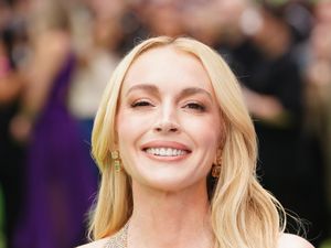 Supporting image for story: Lindsay Lohan asks why no-one protected her as a child star