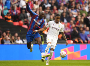 Crystal Palace's Jean-Philippe Mateta fouls Aston Villa's Ezri Konsa during the Emirates FA Cup semi-final match at Wembley Stadium, London. Picture date: Saturday April 26, 2025.