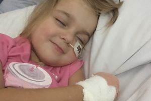 Georgia smiling through her treatment