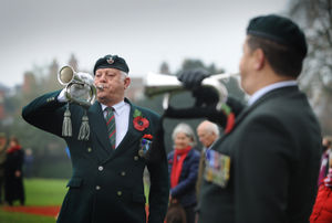 Playing the Last Post (left-right) John Henry Plumridge and Steve Jones, of the Veteran Buglers
