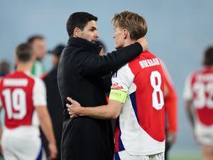 Arsenal manager Mikel Arteta (left) with player Arsenal’s Martin Odegaard