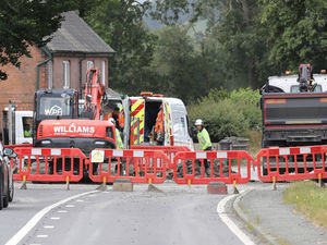 Supporting image for story: Burst water pipe closes major road
