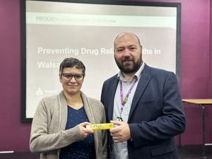 Anne Brunozzi, Service Manager at The Beacon and Councillor Gary Flint with a box of naloxone.