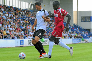 AFC Telfords Andy Owens, left, is closed down by Cliff Moyo at the New Bucks Head last night