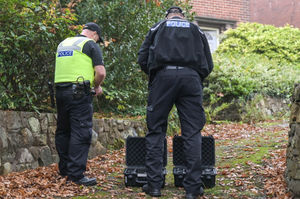 Specialist drone operators outside the house. Photo: SnapperSK