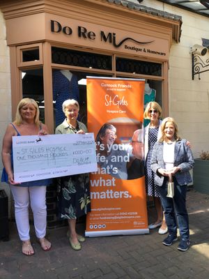 Julie Cassidy of Do Re Mi presents cheque for £1,000 to Cannock Friends of St Giles. L to R: Julie Cassidy of Do Re Mi; Janette Arrowsmith, Cannock Friends of St Giles, Trish Mellor, Cannock Friends of St Giles; Val Jones, Trustee, St Giles Hospice