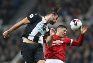 Andy Carroll (left) and Manchester United's Marcos Rojo