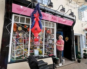 Janice Godbehere from The Olde Confectioners spotted Spider-Man hanging from her roof