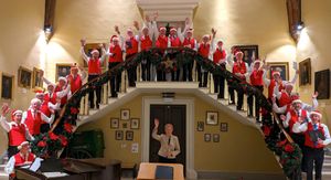 The festive Men in Red with deputy accompanist Maureen Bowkett