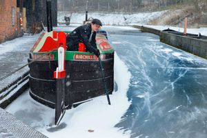 Tony Aldridge breaks ice on the canal at Black Country Living Museum