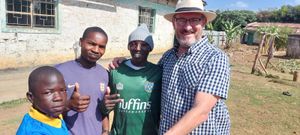 John Herbert, representing Braeburn Schools - and from Shrewsbury, at Hope Patience and Joy Children's Home in Gilgil.