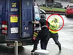 Supporting image for story: WATCH: Security van driver fights off would-be raider outside Aldi