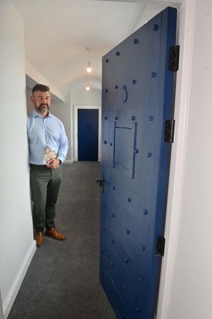 Liam Floyd behind the hefty cell door