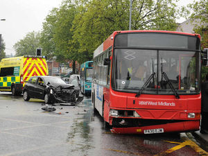 Supporting image for story: Woman injured after car and bus collide