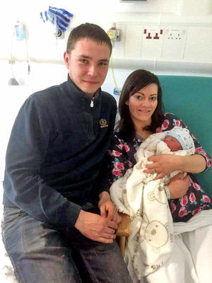 Amy Richards and Matt Mills with baby Jack