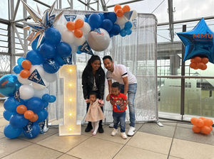 Plenty of people took the chance to stand in front of the hospital's anniversary banner and a balloons, sharing in the day's celebrations. Credit: Midland Metropolitan Hospital