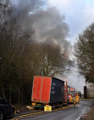 Firefighters battling the blaze in Oak Lane, Kingswinford. Photo: Tim Thursfield
