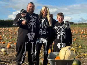 Supporting image for story: Strongman Eddie Hall shows off new baby at pumpkin patch on Shropshire border
