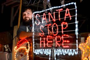 Phillip Watts shows Santa where to make a landing this year