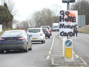 A sign attached to a traffic light on the A64 heading towards the Scarborough (Joe Giddens/PA Wire)