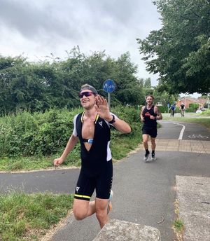 Tom running during the Ironman