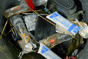 The bucket containing some of the needles
