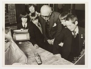 Jack Downing, chairman of the RNLI's Stourbridge branch, pictured with Longlands School pupils who marked Mr Downing's fundraising achievements in Stourbridge with an exhibition. Pictured with Mr Downing were teacher Mrs Margaret Horton and pupils Gavin Harper, Darren Adams, Richard Westwood and Malcolm Riley. December 2, 1980