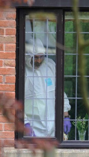 A police forensics officers at the house in Millfield Drive, Market Drayton