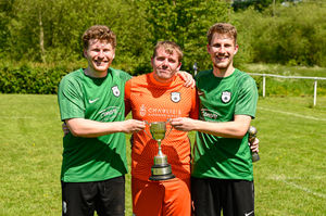 Tom Dyas, centre, celebrates with team mates Dan Jones, left, and Will Jones after winning the Shrewsbury Sunday League first division in 2022 with Lokomotiv Reabrook