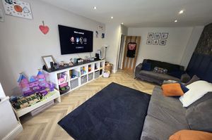 The living room is at the front of the house