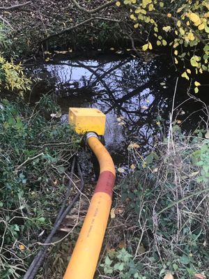 Crews used a nearby stream as a water supply