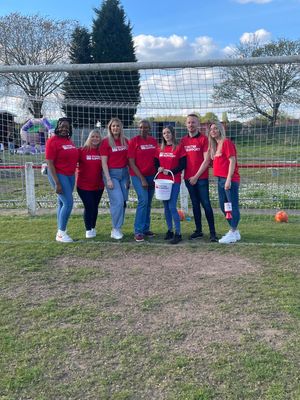 Kirsty and Nathan's mother with volunteers at the tournament