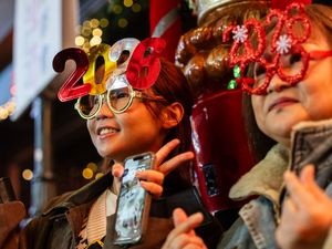 Supporting image for story: Hong Kong rings in 2026 without fireworks after deadliest blaze in decades