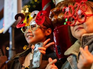 Supporting image for story: Hong Kong rings in 2026 without fireworks after deadliest blaze in decades