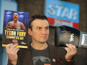 Supporting image for story: Knockout! Tyson's glove raises £280 for Shropshire cancer group