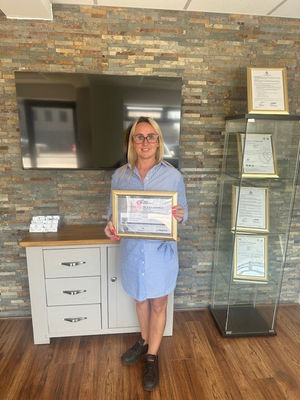 Ewelina Lewocka, who has recently been promoted to Assistant Production Manager, with the certificate